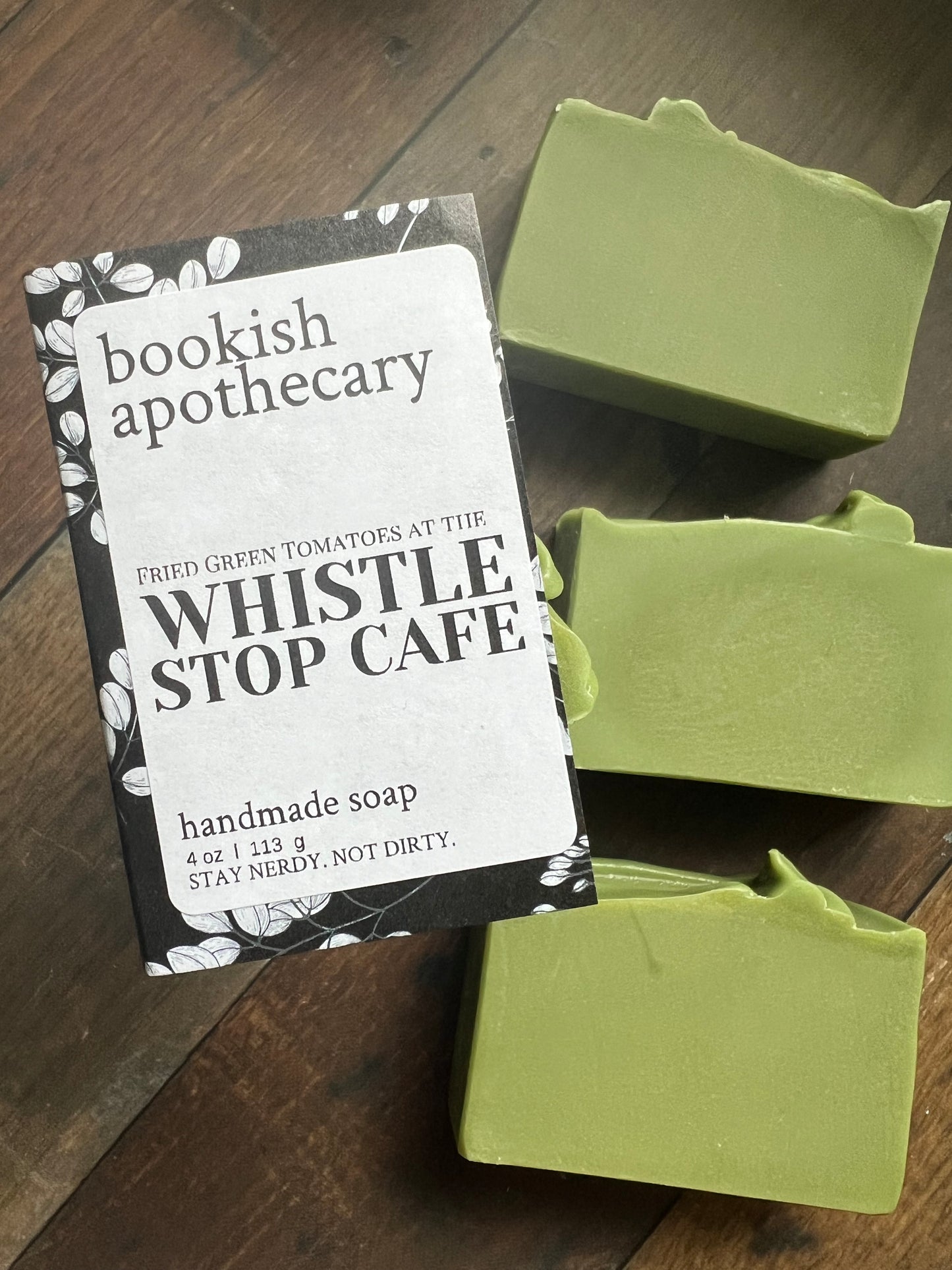green bars of soap with bookish apothecary branding