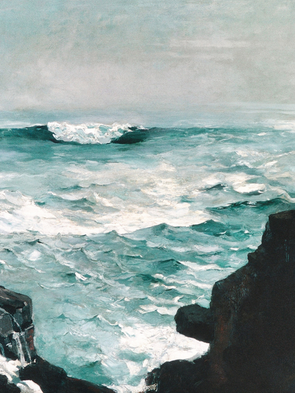 Rough ocean waves crashing against rocks with a cloudy sky.